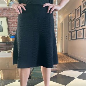 Cabi. Stretch knit mid length skirt.